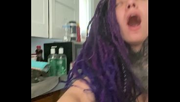 Latina Dreadhead Bent Over Kitchen Counter