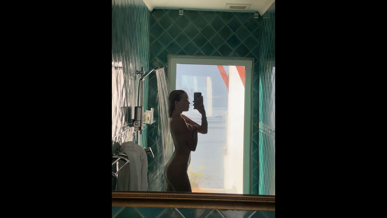 Latina Teases Nude Pussy On Camera