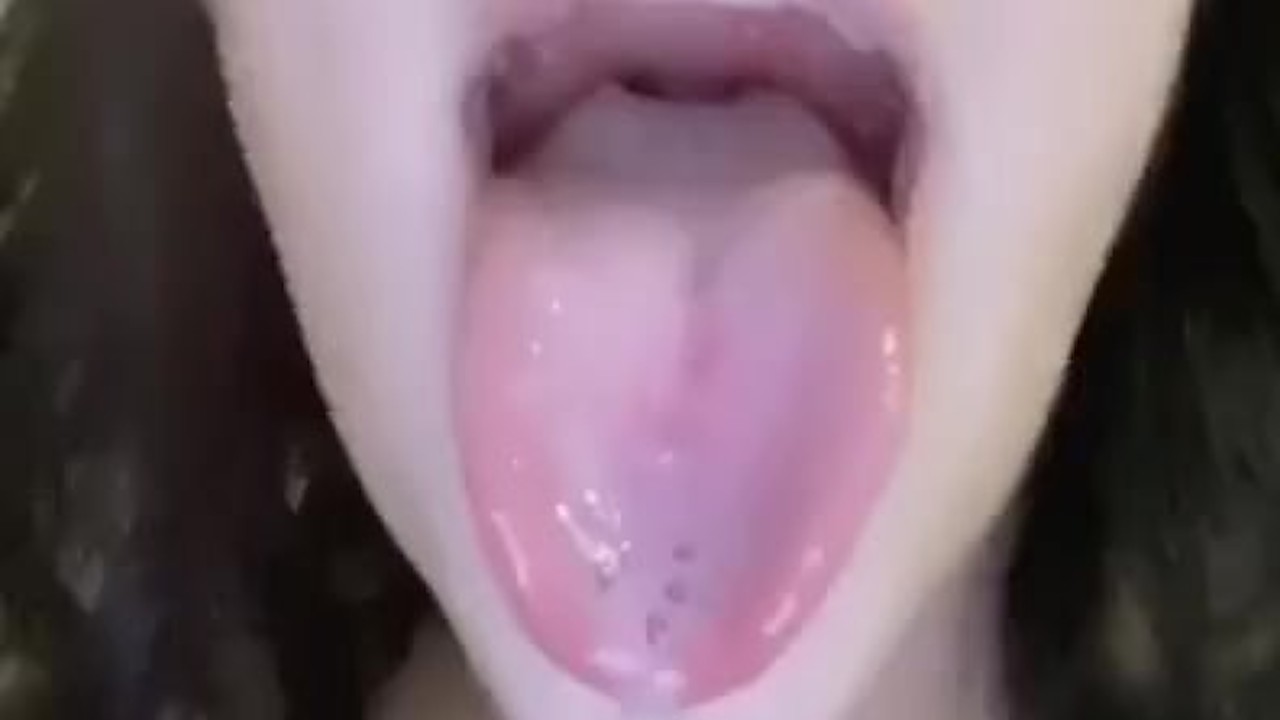 Latina Woman Uses Her Tongue