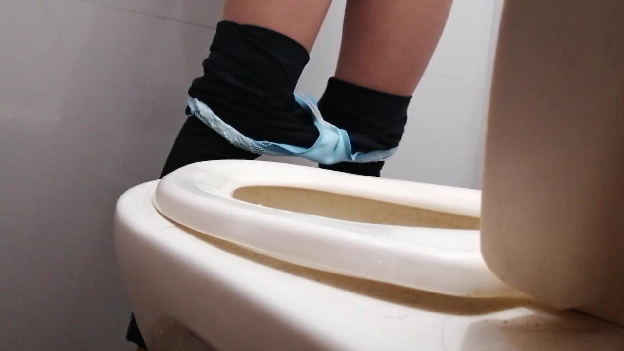 Latina Girl Peeing Standing in Bathroom